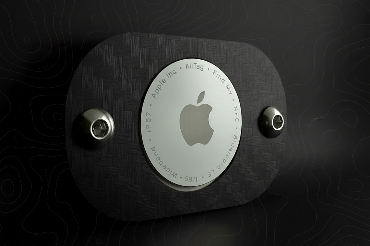 Black device with Apple logo on a dark background