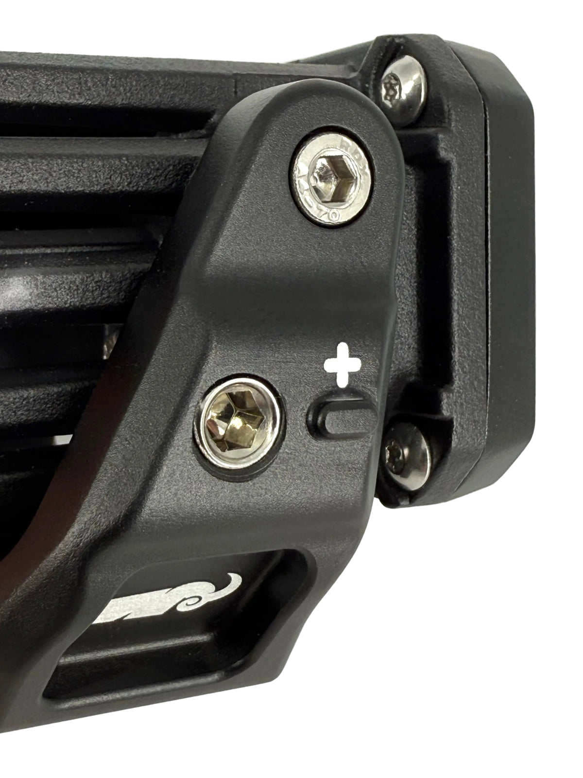 Close-up of a mount with screws and a brand logo on a white background