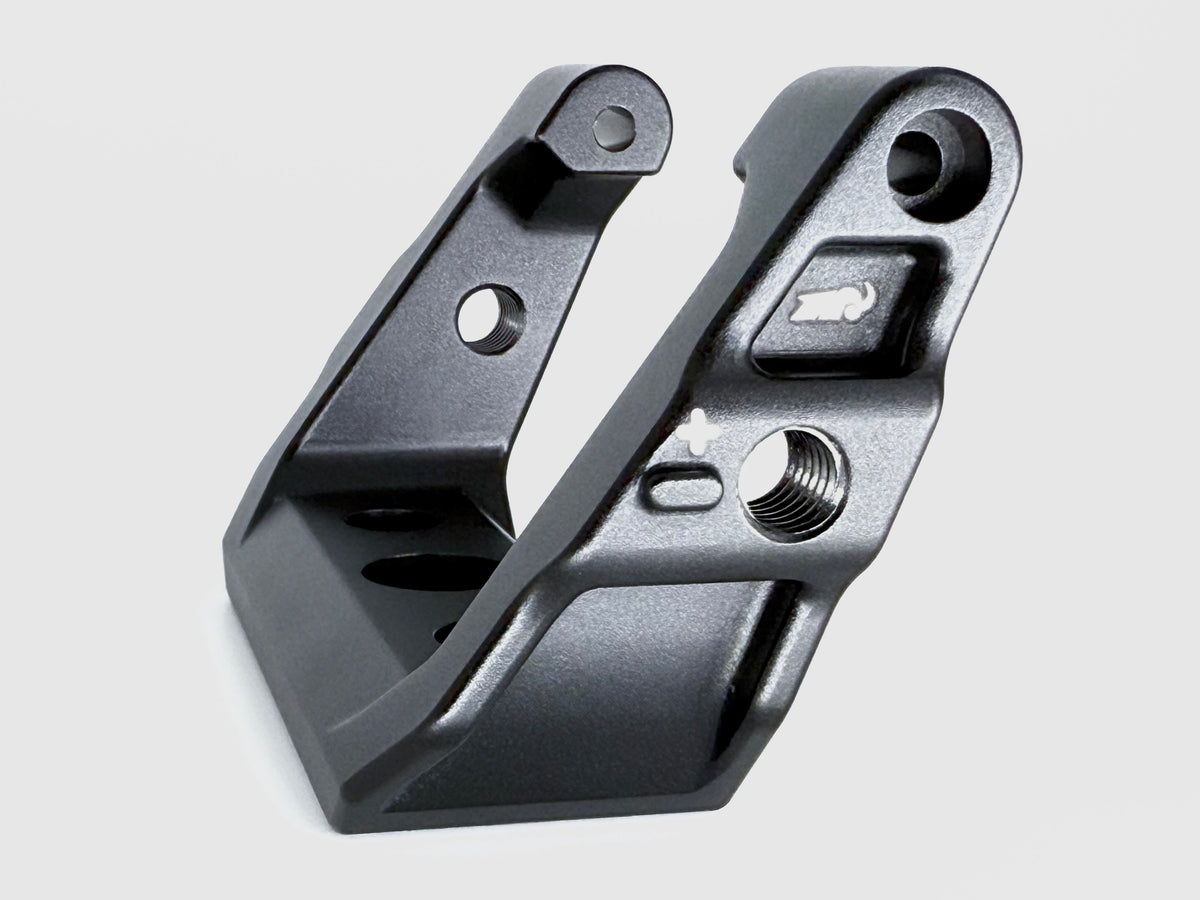 Metal mechanical component on a light gray background