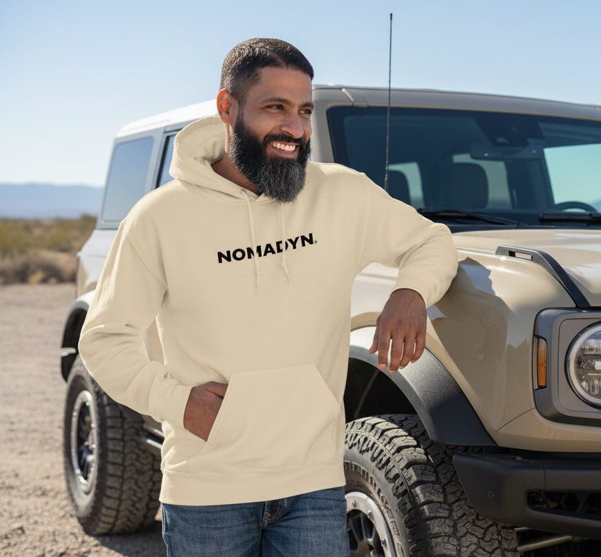 Man standing next to Ford Bronco